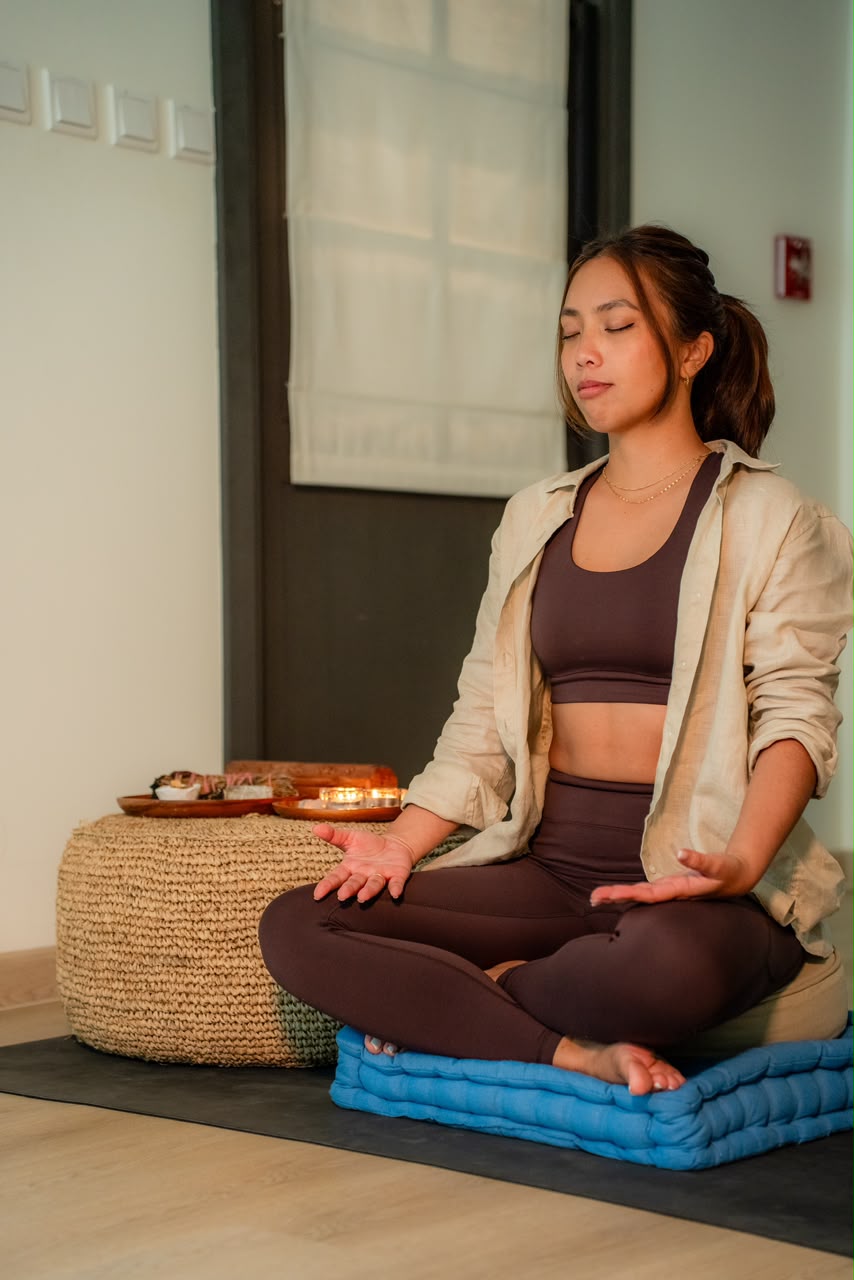 Alyson Fajardo seated meditation with open palms