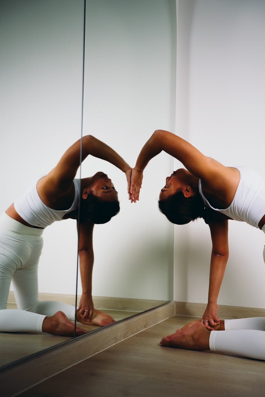 Alyson Fajardo performing camel pose yoga backbend